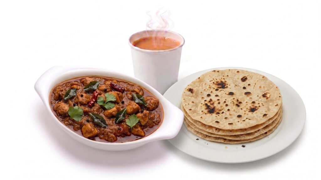 Chapati with chicken curry and karak tea combo served at Al Maseera Cafeteria